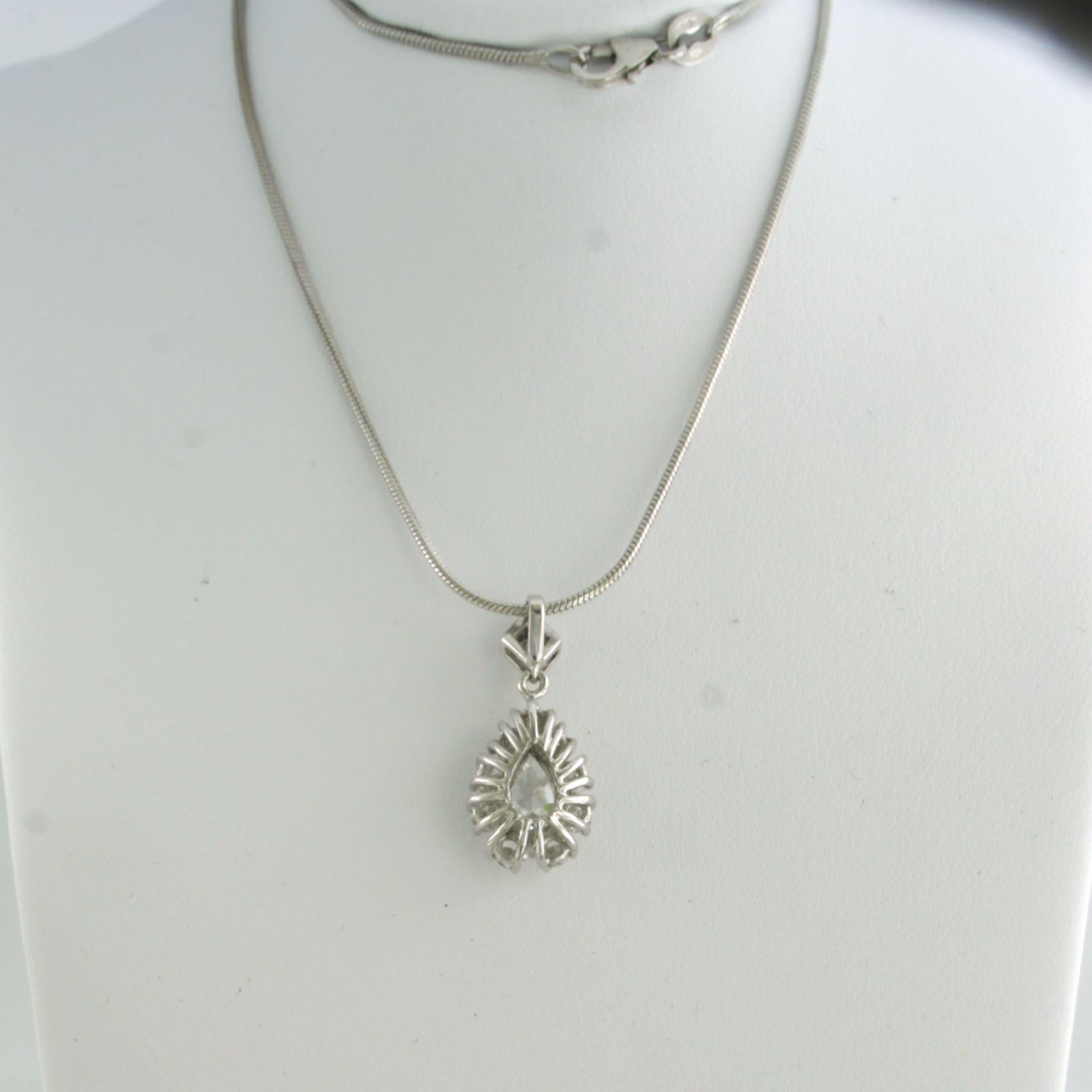 14k white gold necklace with pendant set with a central pear-shaped cut diamond up to 1.00ct - F/G - VS/SI and an entourage of brilliant cut diamonds up to 1.00ct. 0.75ct - F/G - VS/SI - 40 cm long 

detailed description

the length of the necklace