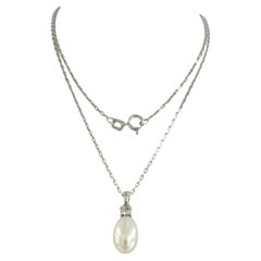 Necklace and pendant with pearl and brilliant cut diamond up to 0.10ct 14k gold