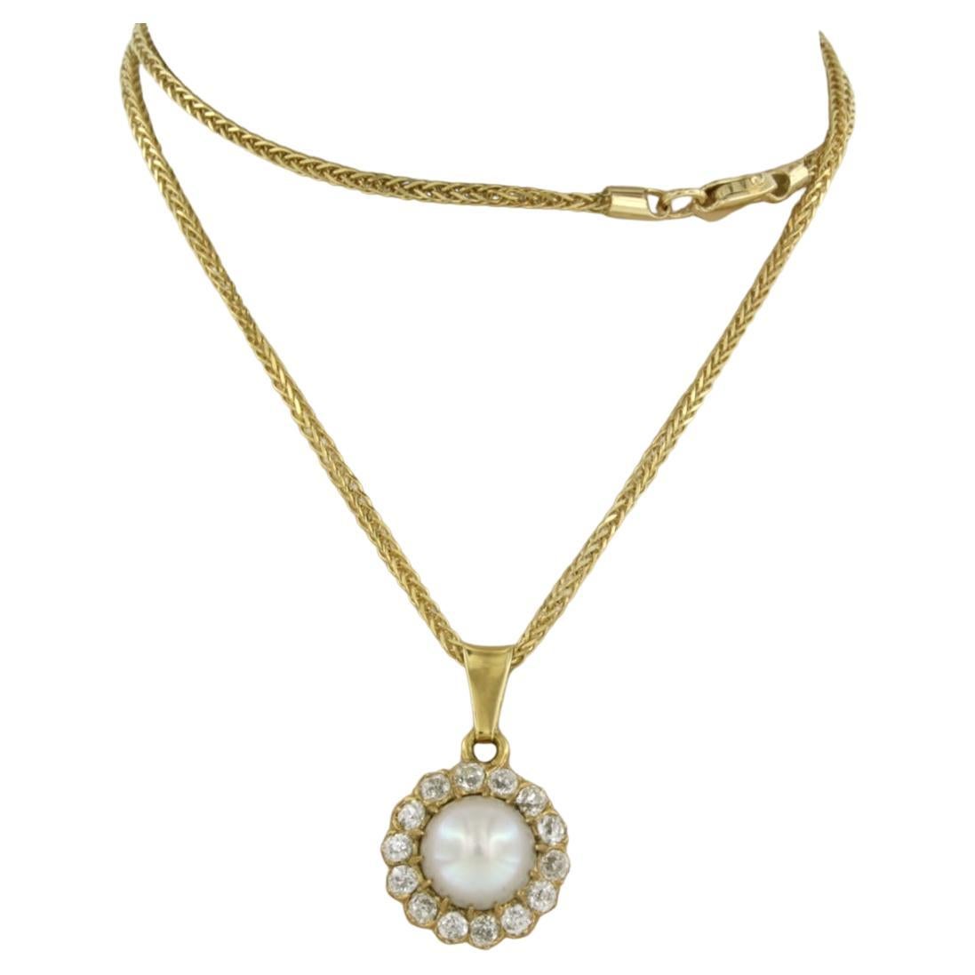 Necklace and pendant with pearl and old mine cut diamonds up to 0.70ct 14k gold