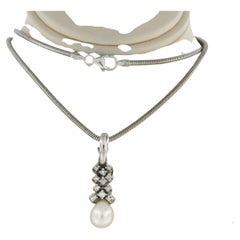 Necklace and pendant with pearl and single cut diamond up to 0.30ct 14k gold