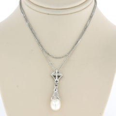 Necklace and pendant with pearl and single cut diamonds up to 0.15ct 14k gold