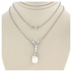 Necklace and pendant with pearl and single cut diamonds up to 0.23ct 14k gold