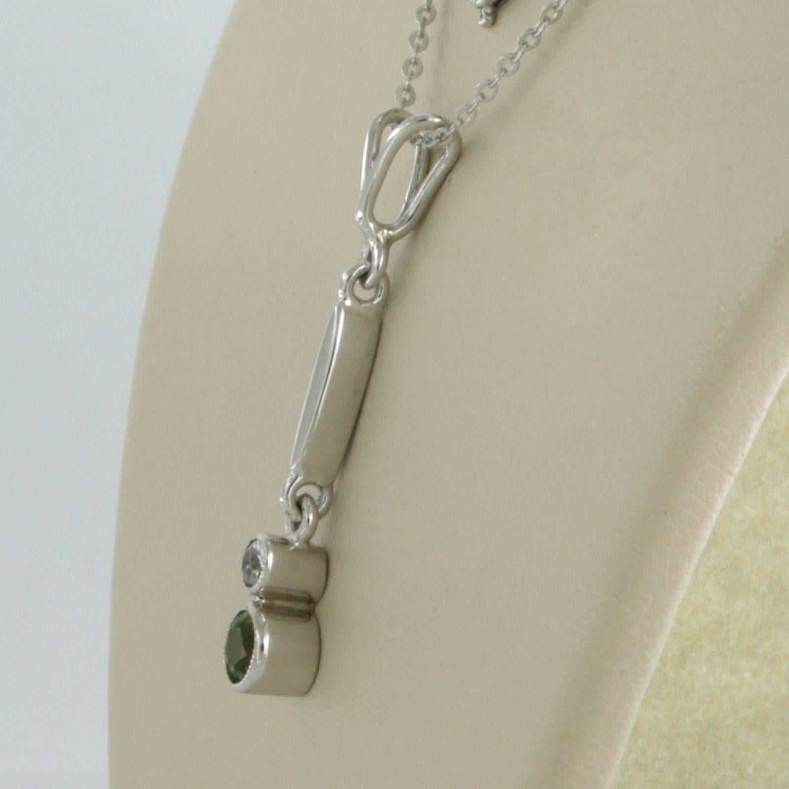 Modern Necklace and pendant with peridot and old mine cut diamonds 14k white gold For Sale