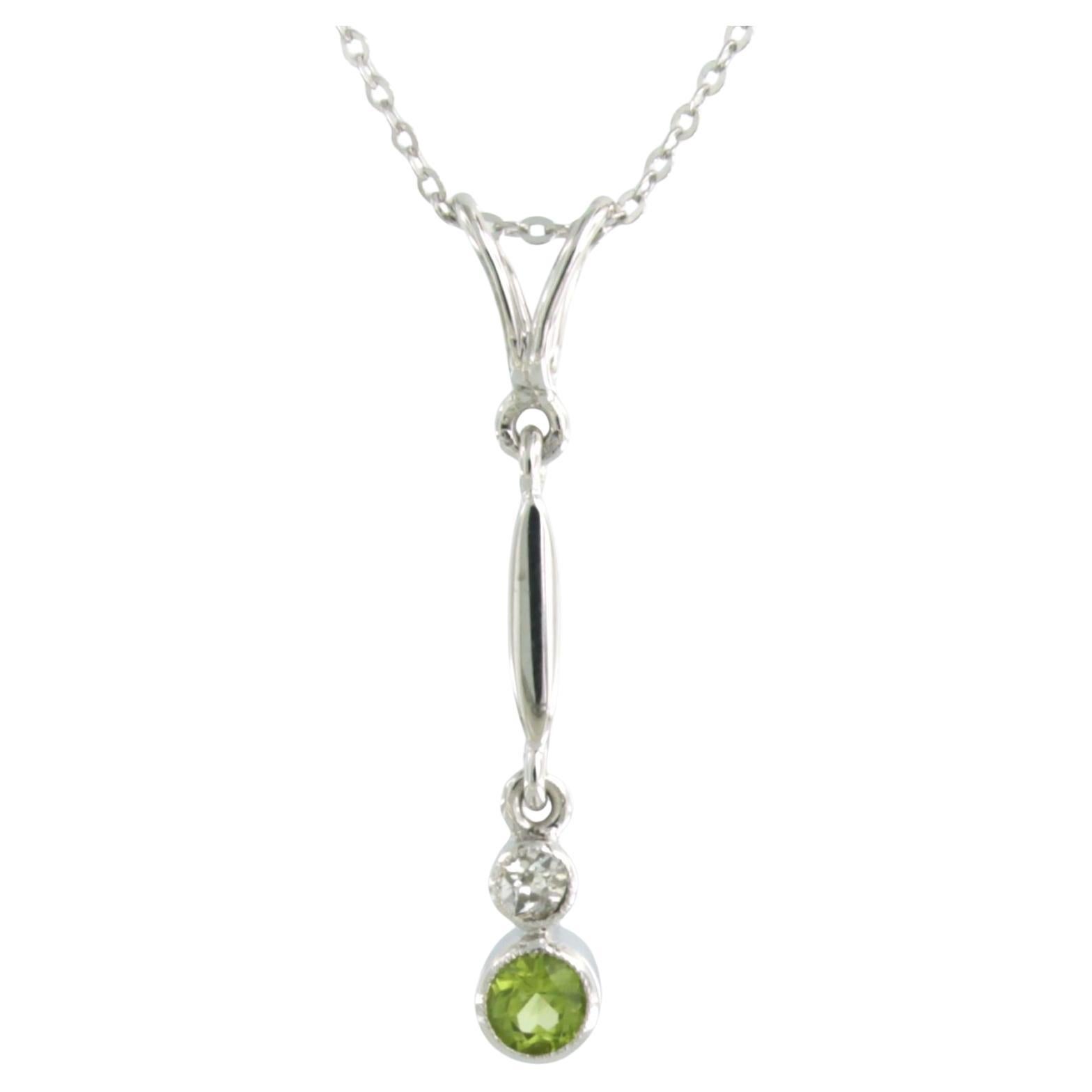 Necklace and pendant with peridot and old mine cut diamonds 14k white gold