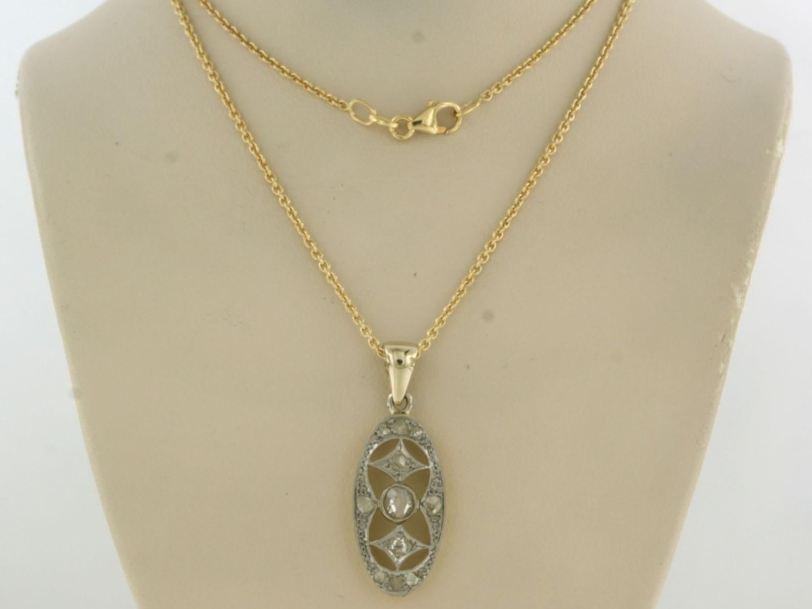 18k gold necklace with a bicolour gold pendant set with rose diamonds up to 0.20ct - G/H - VS/SI - 45cm long

detailed description:

necklace is 45 cm long, and 1.3 mm wide

size of the pendant is approximately 3.0 cm long by 1.1 cm wide

total