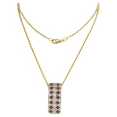 Collier et pendentif en or bicolore 18 carats avec rubis et diamants