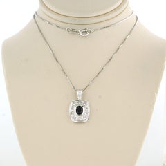 Necklace and pendant with sapphire and brilliant cut diamond 18k gold