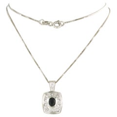 Necklace and pendant with sapphire and brilliant cut diamond 18k gold