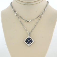 Necklace and pendant with sapphire and brilliant cut diamonds 18k gold 9.1 grams