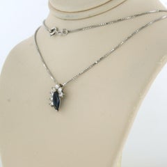 Necklace and pendant with sapphire and brilliant cut diamonds 18k gold