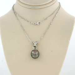 Necklace and pendant with Tahiti pearl and brilliant cut diamonds 18k gold