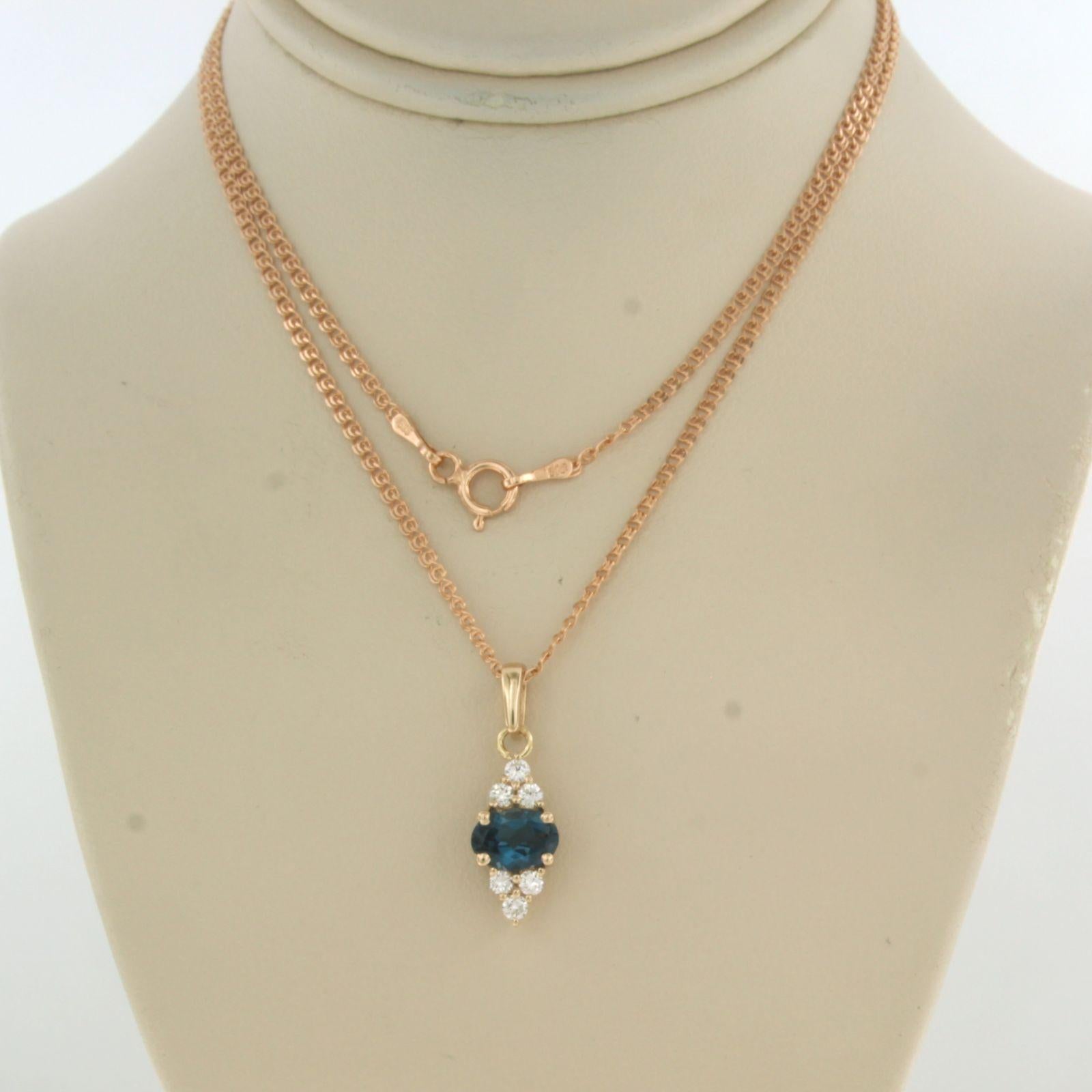 14k pink gold necklace with a pendant set with topaz. 0.90ct and brilliant cut diamonds up to 0.20ct - F/G - VS/SI - 45 cm long

detailed description:

the necklace is 45 cm long and 1.5 mm wide

The size of the pendant is 2.0 cm by 7.0 mm