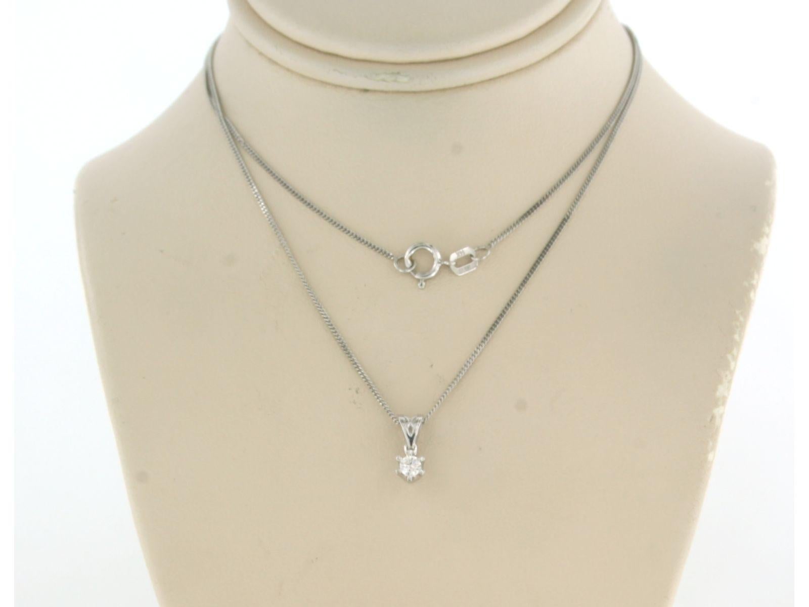 14k white gold necklace with a solitaire pendant set with brilliant cut diamonds up to. 0.09ct - F/G - VS/SI - 45 cm long

detailed description:

necklace is 45 cm long and 0.7 mm wide

size of the pendant is approximately 1.0 cm long by 3.9 mm