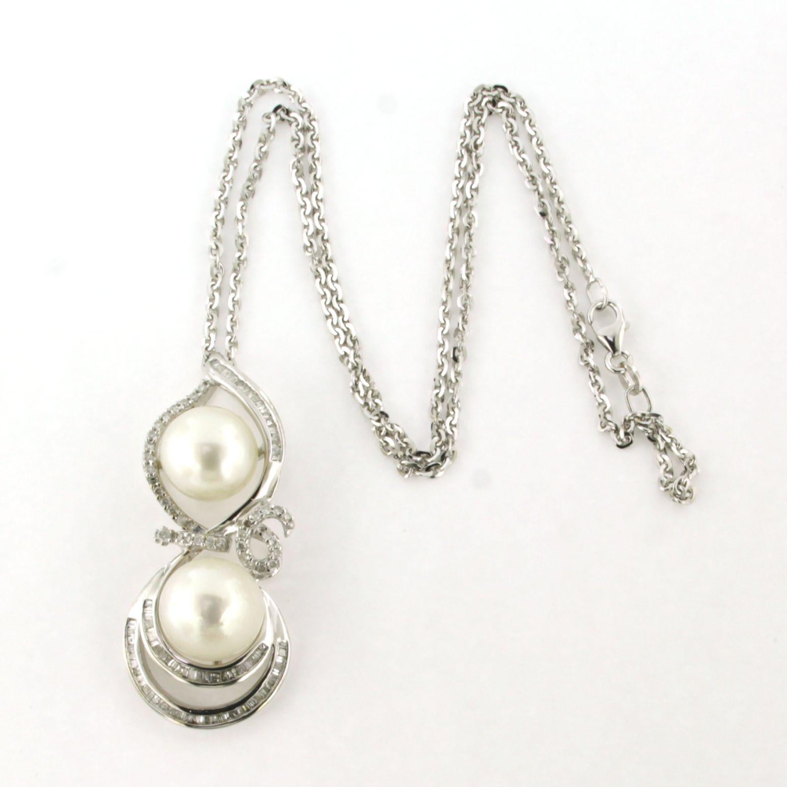 Collana in oro bianco 18k con pendente con perle e diamanti taglio brillante e conico fino a 1,00ct - F/G - piq. - 40 cm 

descrizione dettagliata:

la lunghezza della collana è di 40 cm di lunghezza per 1,5 mm di larghezza

Le dimensioni del