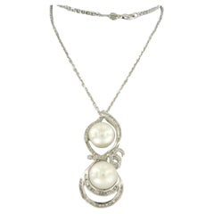 Collier etpendant en or 18 carats avec perles et diamants effilés et brillants