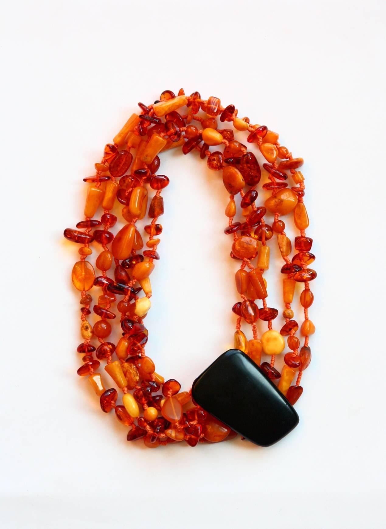 Veri nice amber different color with old lava black button total length 55cm.
All Giulia Colussi jewelry is new and has never been previously owned or worn. Each item will arrive at your door beautifully gift wrapped in our boxes, put inside an