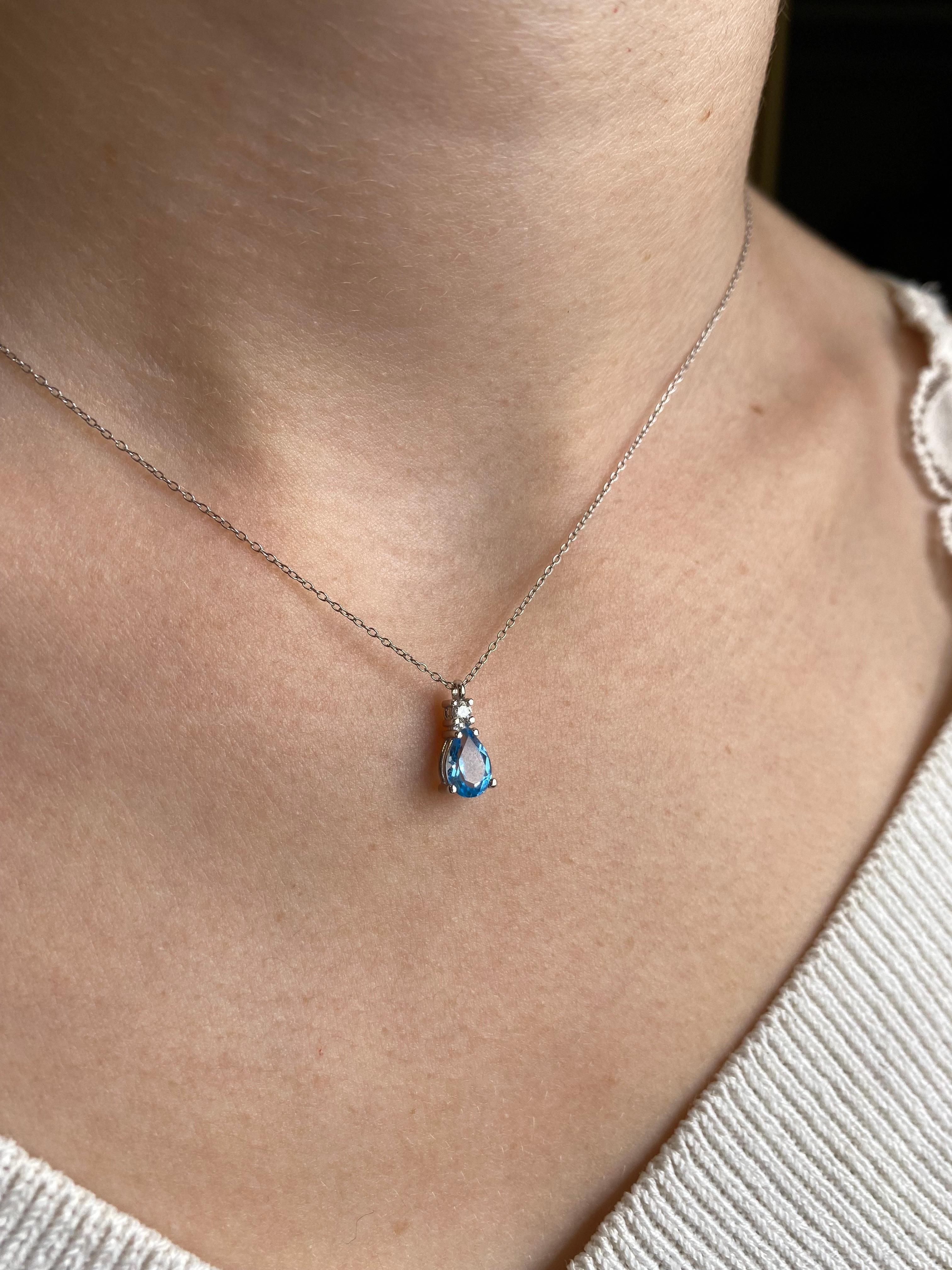 Bead Necklace Blue Topaz Pendant with a Diamond White Gold 18 Karats For Sale