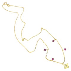 Halskette CAMPANILLA aus Gold und Rubinen