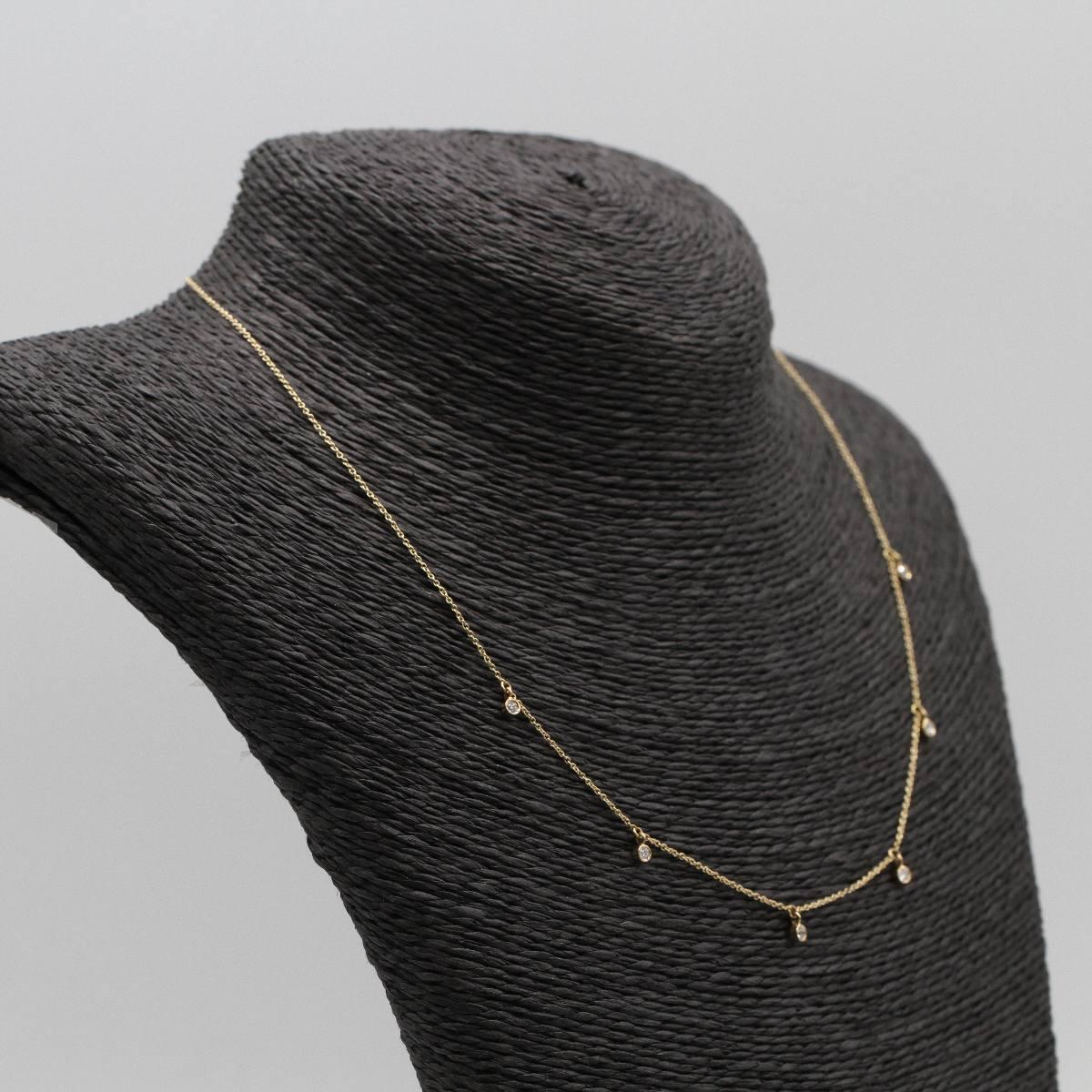 Women's Diamond Necklace  6x Round Brilliant Cut Diamonds  Total 0.022ct, G/VS Quality  18K Yellow Gold  Chain Length: 45cm, Adjustable to 42cm  Ref.: D364601GM
This women’s diamond necklace is a delicate yet luxurious piece, perfect for both