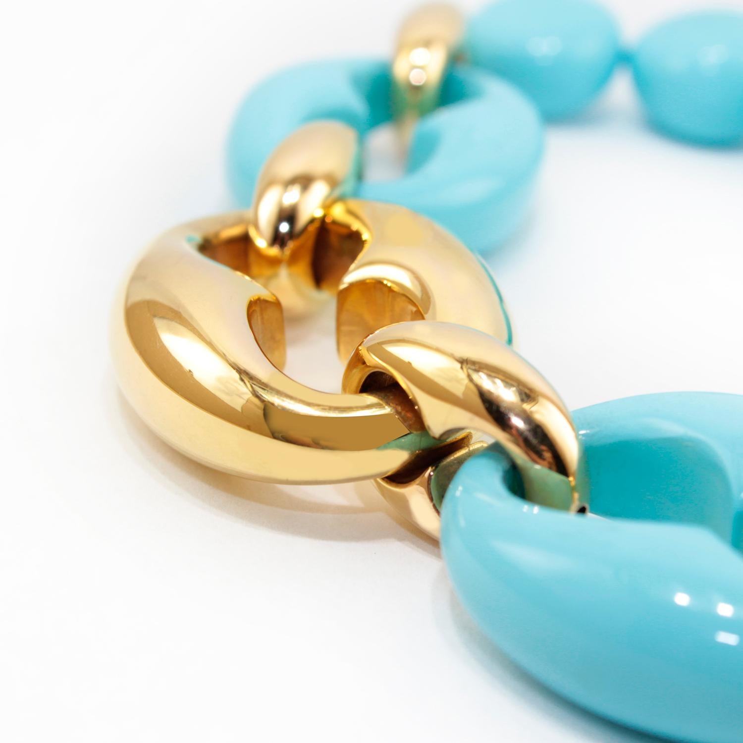 Long necklace realized in composite turquoise beads and 18kt yellow gold. 
Gold g. 15
Total lenght cm 89
