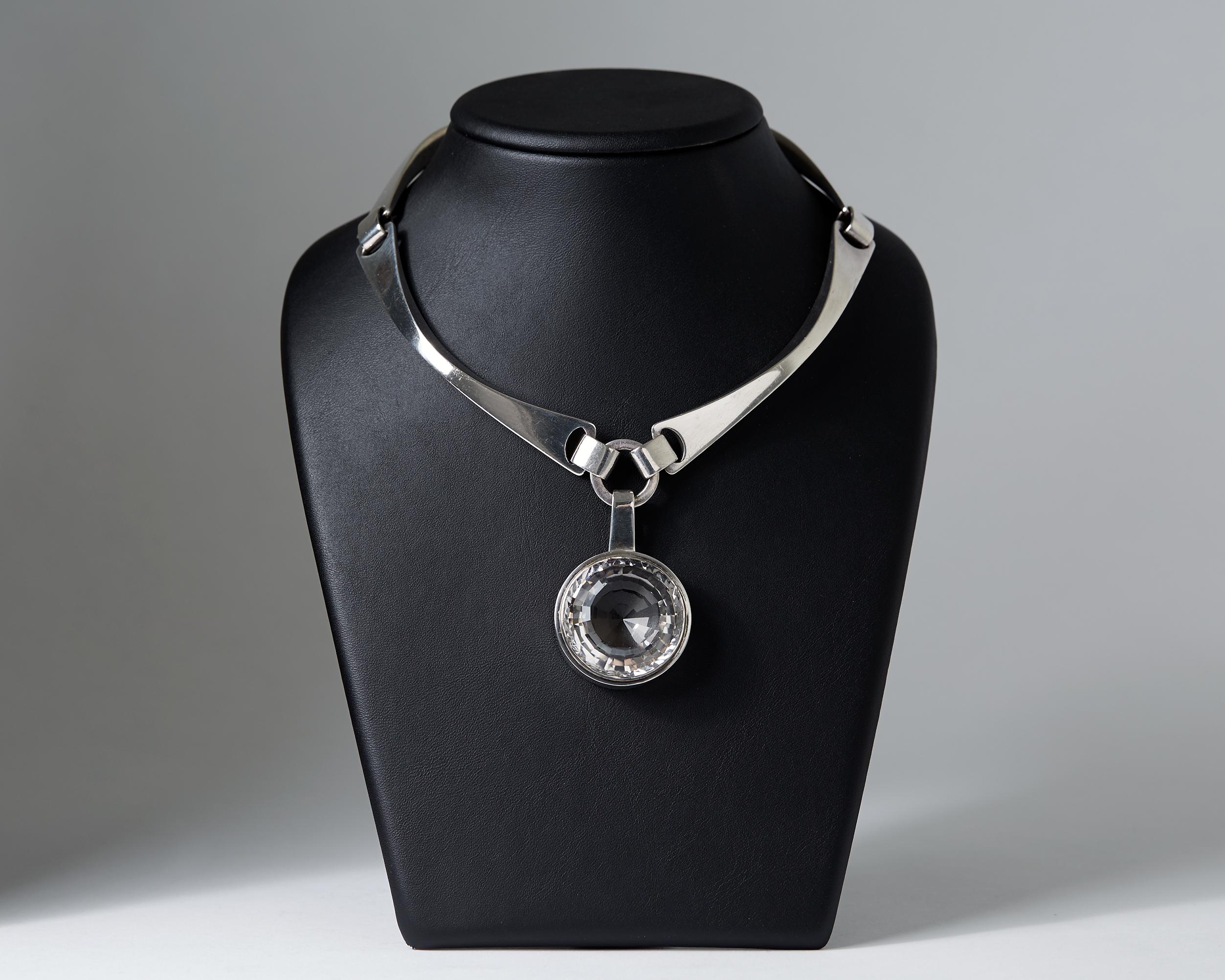 Heavy sterling silver and rock crystal.

L: 40 cm/ 15 3/4''
Lenght of the pendant: 5 cm/ 2''