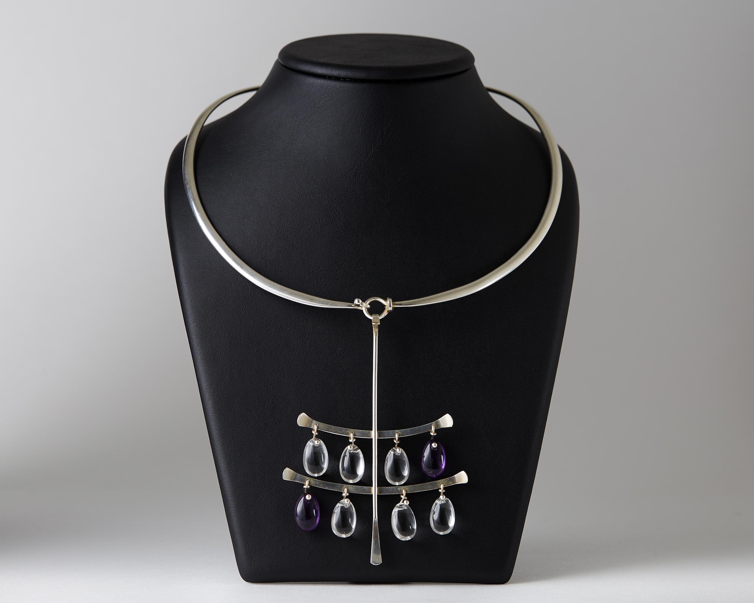 Rock crystal, amethysts, and sterling silver.
