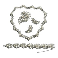 Retro Necklace, earrings, bracelet and brooch, in paste and pearls, Jomaz, USA, 1950s.