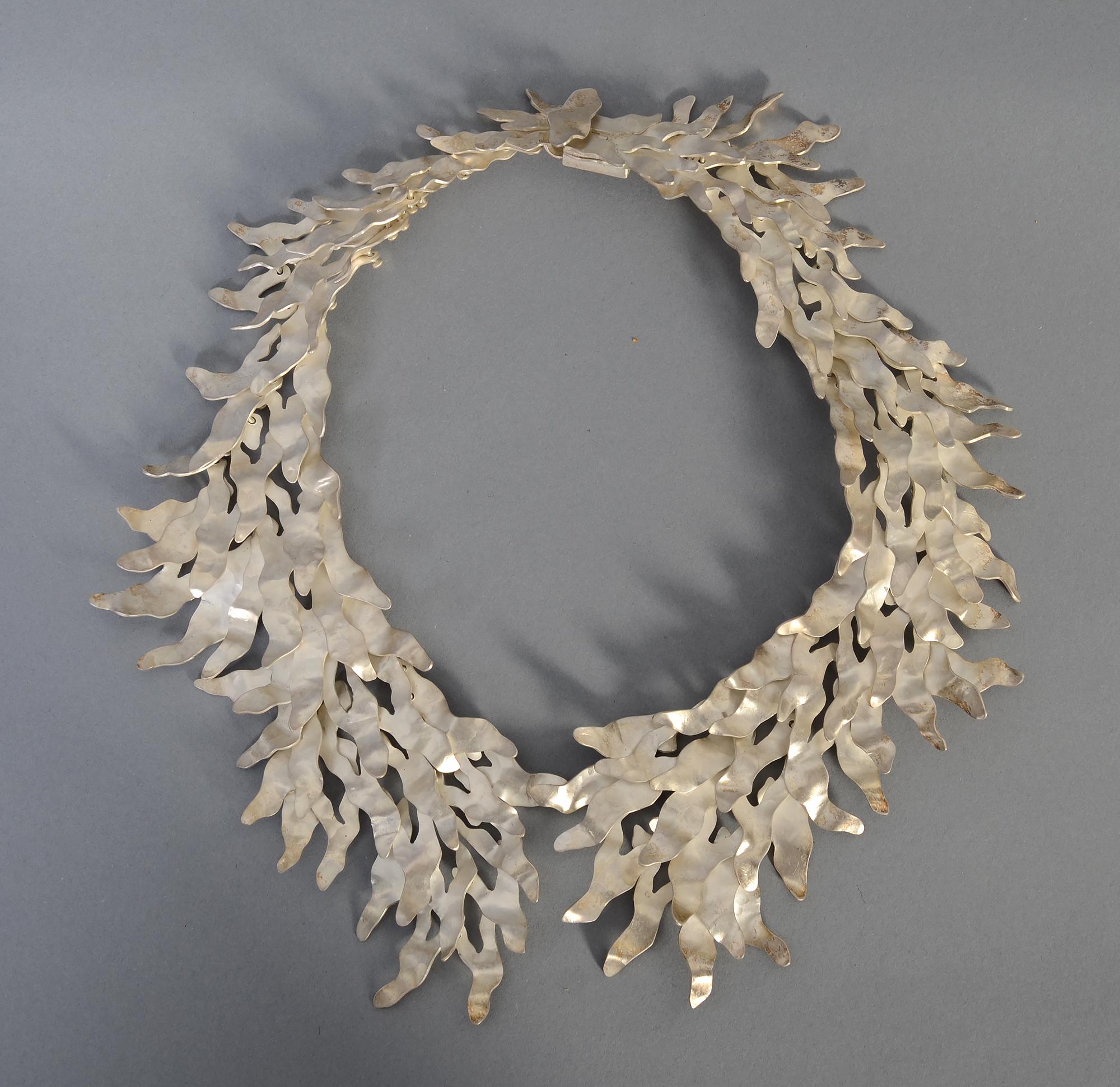 Absolutely stunning, unusual necklace by Mexican architect turned jeweler, Eduardo Herrera. Hammered, undulating links of 950 silver (higher silver purity than sterling) create a wonderful form and texture. Herrera's work has been on exhibit at the