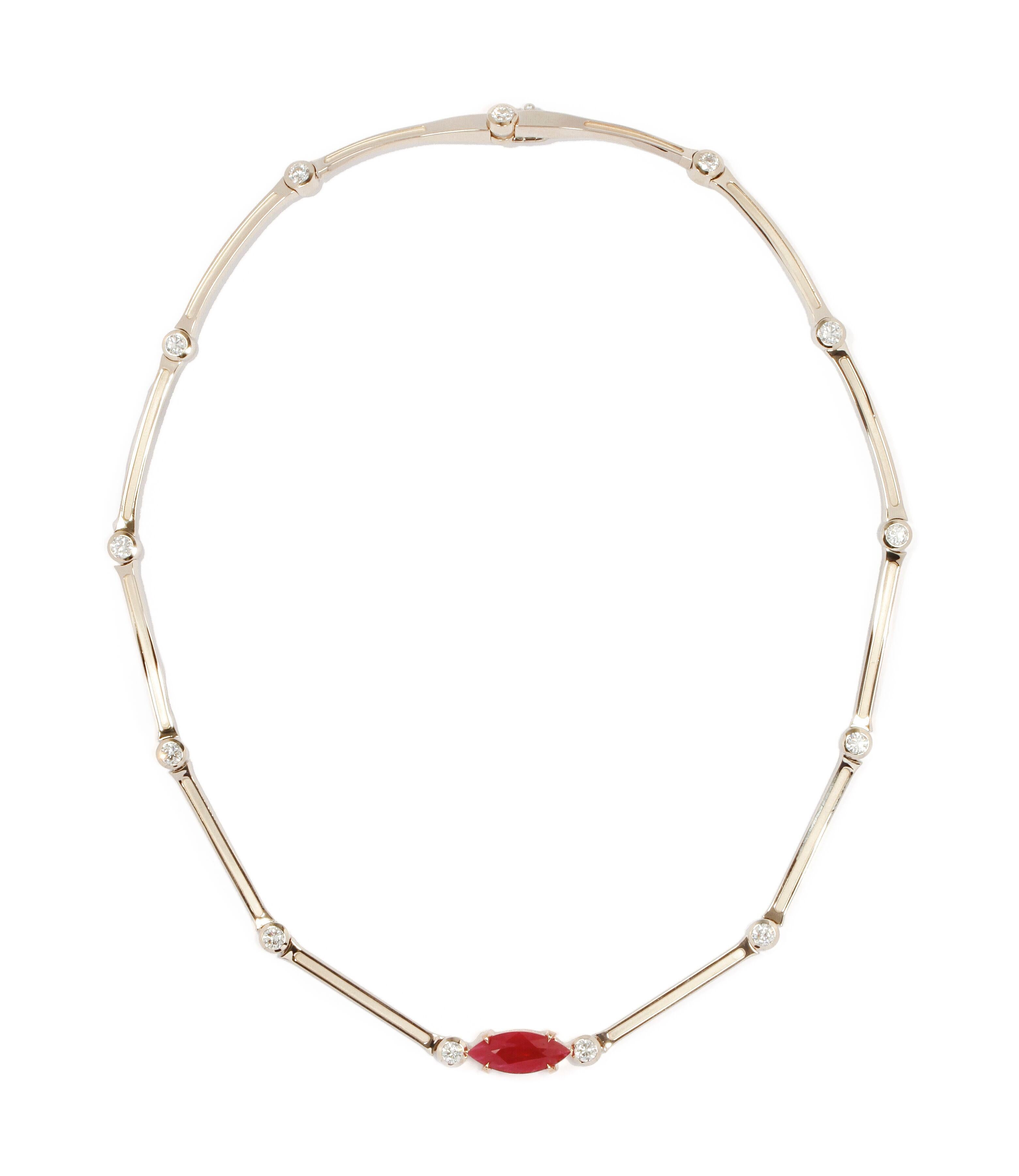 This Ara Vartanian Necklace features a GIA Grading Report certified Pigeon’s Blood Burmese Ruby of Vivid Red colour, in a marquise brilliant cut, weighing 6,05ct (six carats and five points), disposed on an articulated 18K White Gold Necklace,