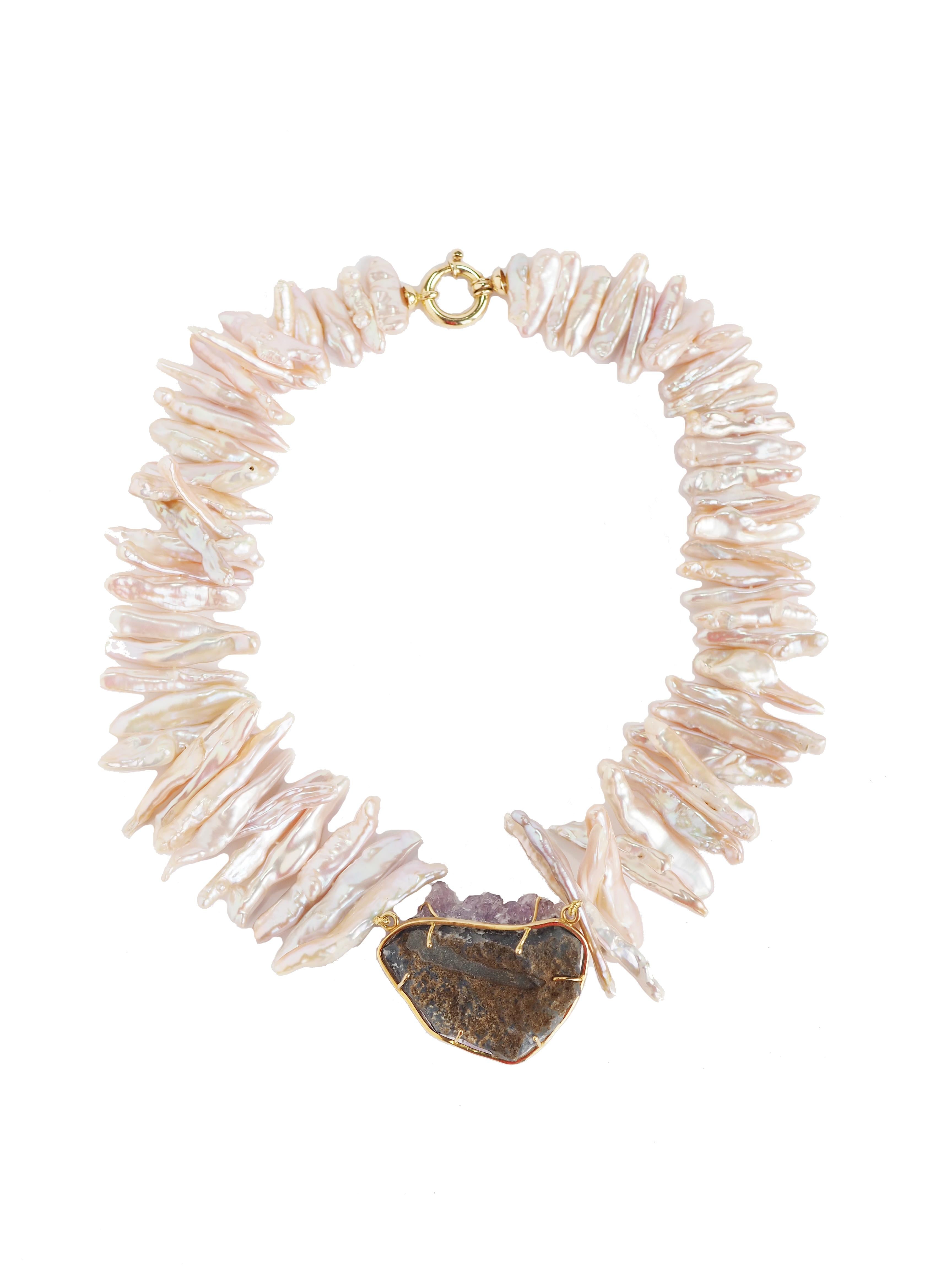 Special rose Biwa natural pearls coming from Japan very rare one, crystal druzy amethyst gold 18kt gr 8,70. Total length 45 cm.
All Giulia Colussi jewelry is new and has never been previously owned or worn. Each item will arrive at your door