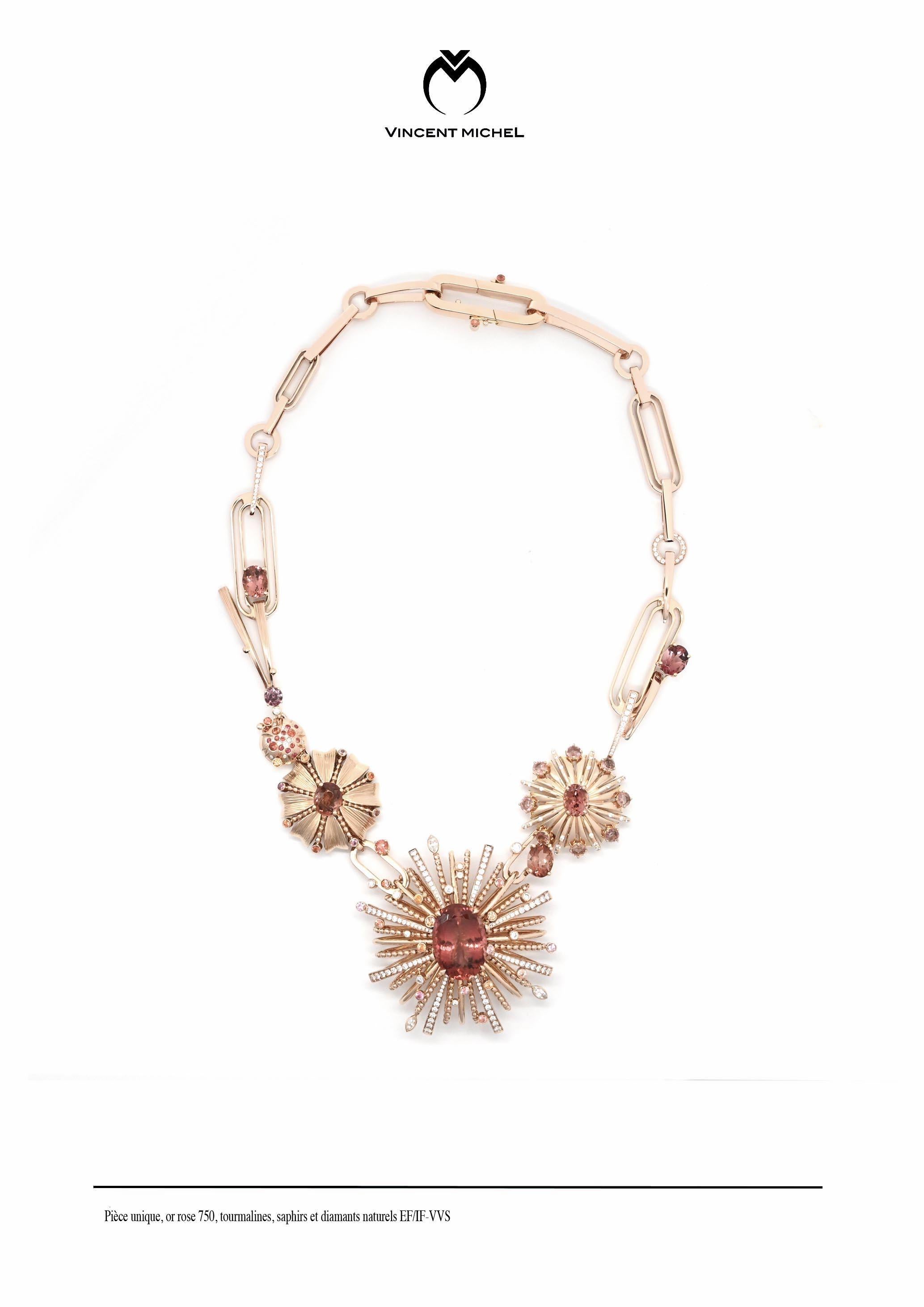 The Nuit d'Eclats necklace (Night of Radiance) is crafted in 750 rose gold and set with tourmalines (central oval : 18.01cts)  209 top quality DEF/IFVVS
natural diamonds (brilliant and
marquise cut) and orange sapphires. 

Entirely handcrafted in