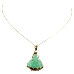 Necklace in 14 carats yellow gold a jade's pendant in the shape of Buddha 