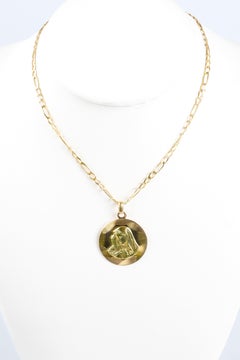 Necklace in 18-carat yellow and pink bicolor gold with a chain and a Virgin Mary