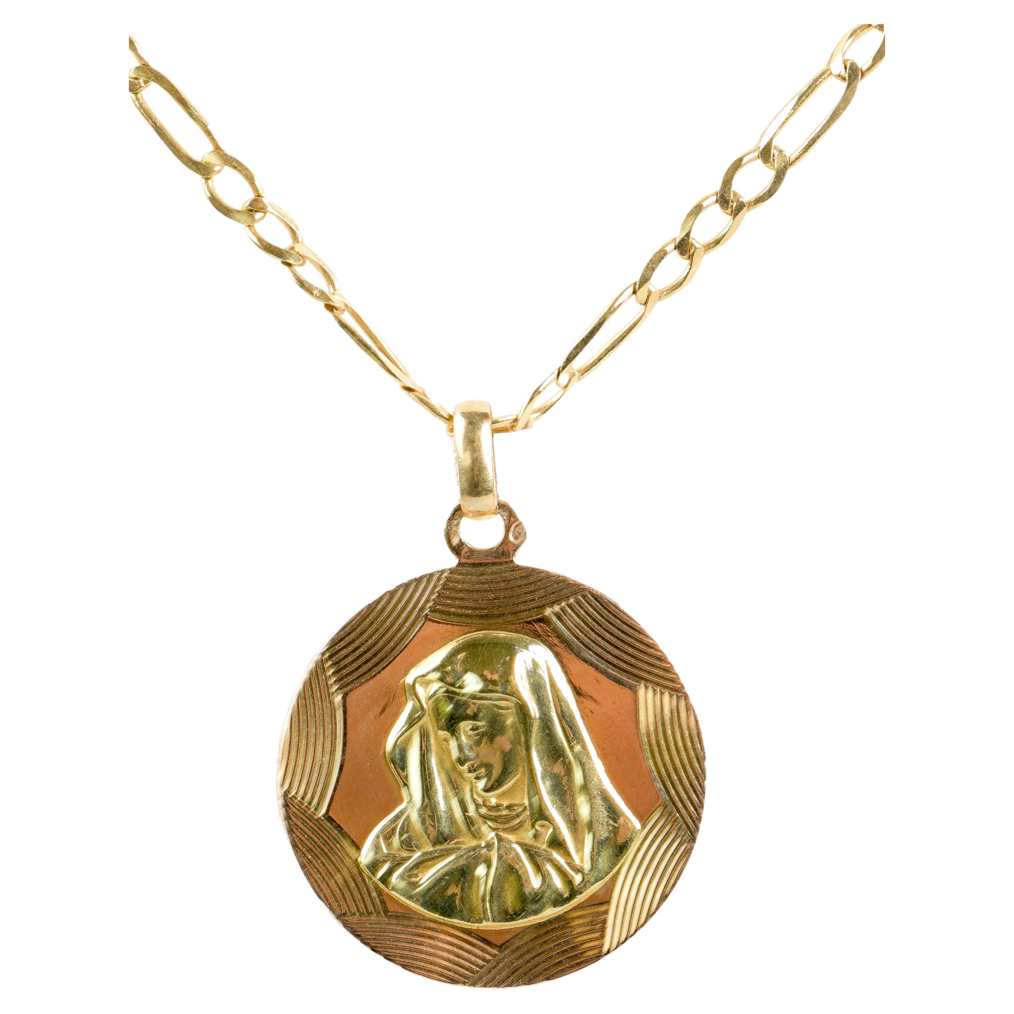 Necklace in 18-carat yellow and pink bicolor gold with a chain and a Virgin Mary For Sale
