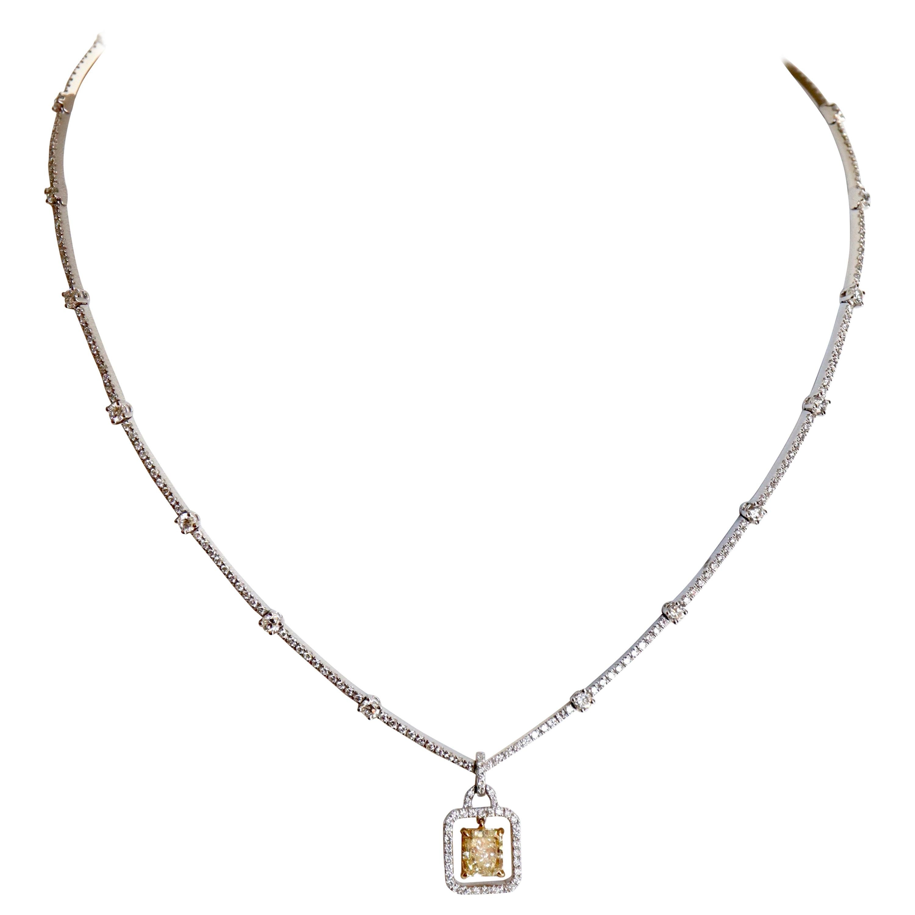 Necklace in 18 Karat Gold, Platinum and Diamonds and 1.5 Carat Yellow Diamond For Sale