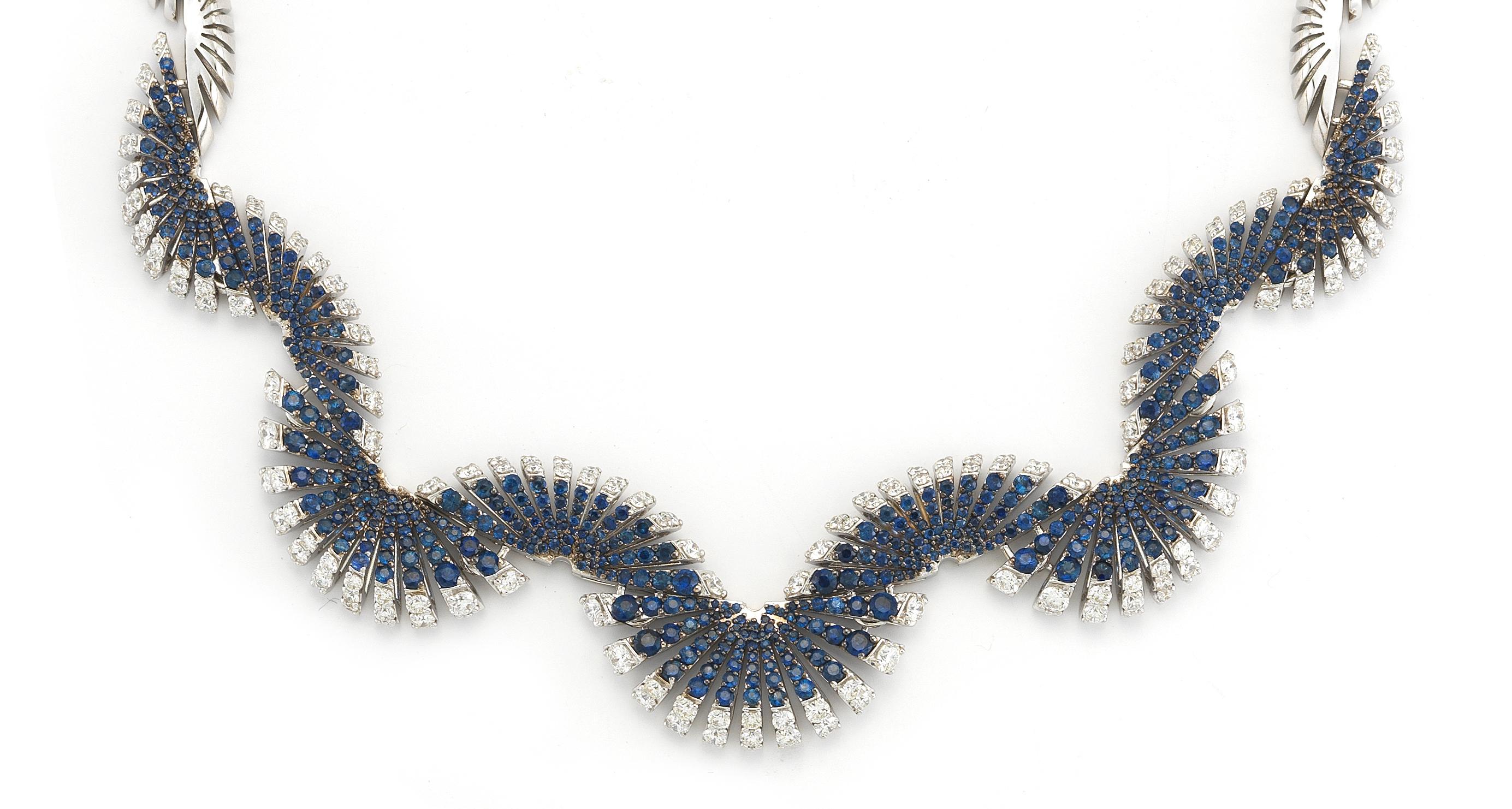 Raggi necklace in 18K white gold with white diamonds and blue sapphires
