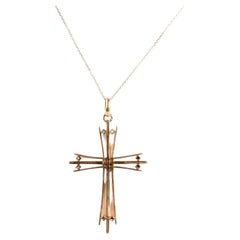 Necklace in mesh with pendant of an atypical cross in 18carat yellow gold