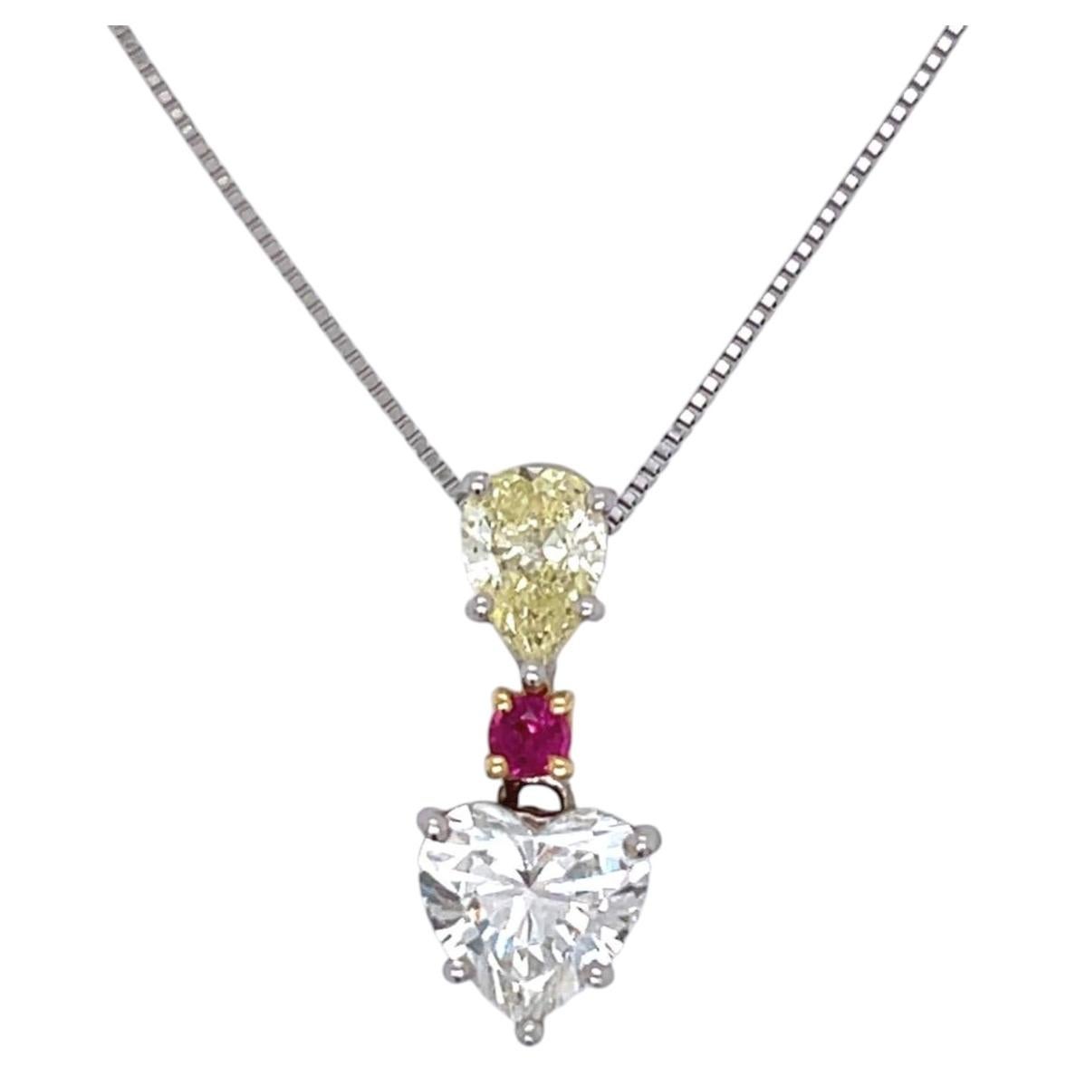 Necklace in Platinum & 18K Featuring 1.90 Ct Heart Diamond, Yellow Pear & Ruby For Sale