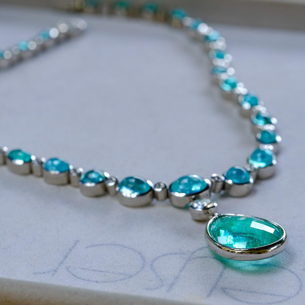 Contemporary Necklace in Platinum with 29 Paraiba Tourmaline Cabouchons and 46 Diamonds For Sale