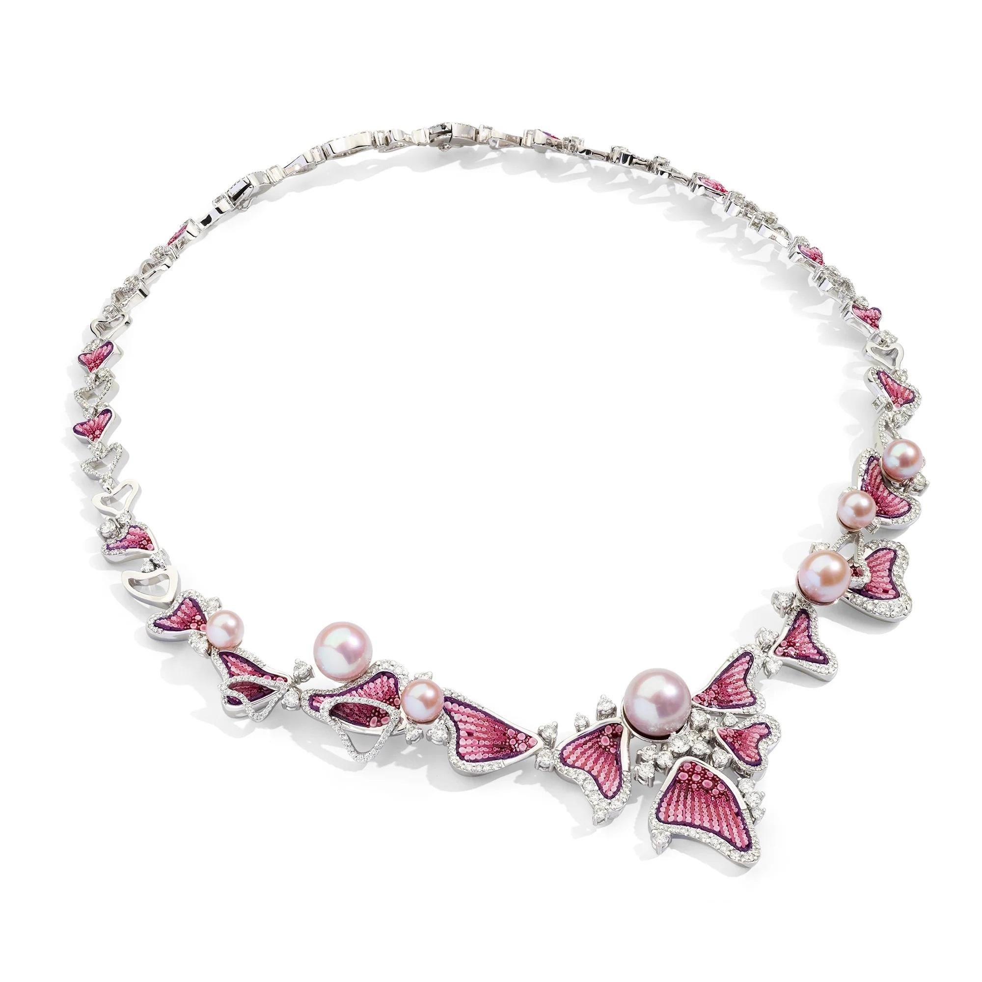 Inspired by the vibrancy of the seabed, the 18-carat white gold Anemone Blush necklace echoes the grace of supple coloured fins. 
A micro-mosaic in shades of pink enriches the composition, while brilliant-cut white diamonds add sparkle. 
Refined