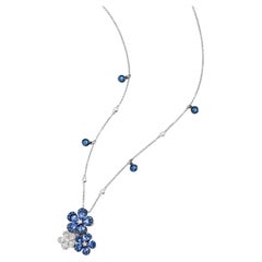 Collar de Oro Blanco con Diamantes y Zafiros Azules