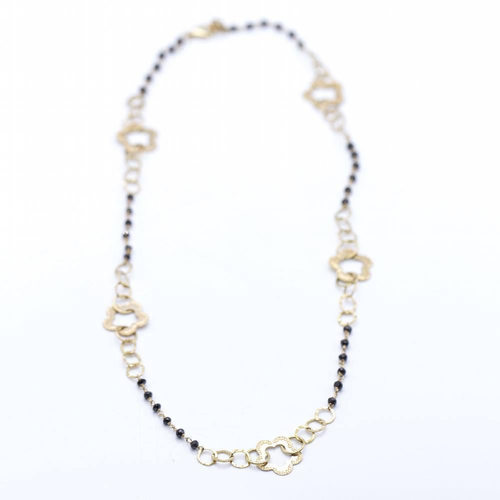 Floral design chain for women : 18kt yellow gold and black spinels : 7,70 grams : 45,5 cm long : 45,5 cm long : Carabiner clasp. Brand new product  Ref: N102870LF