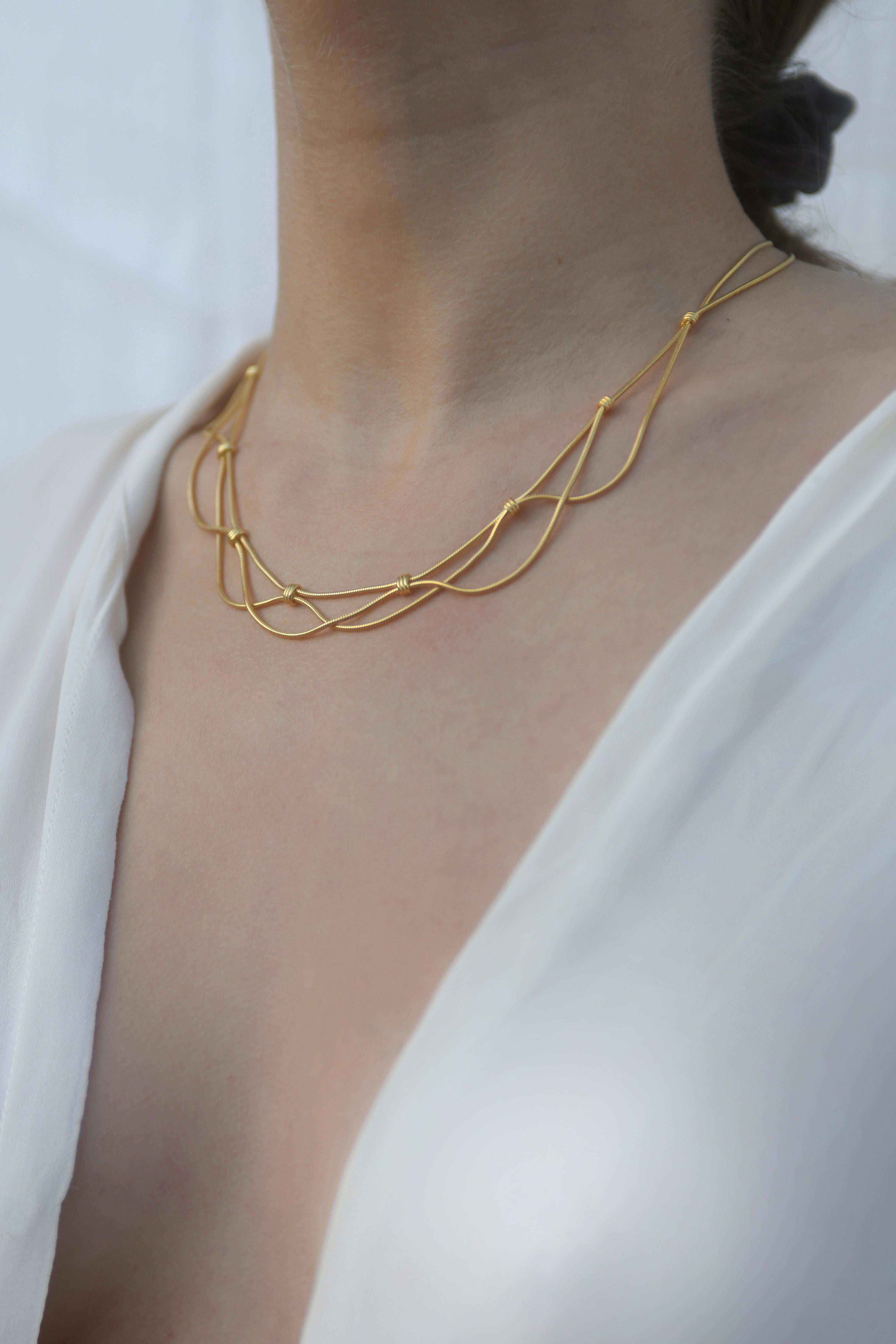  Aura full necklace

A graceful piece inspired by the movement of nature. This piece is made out of gold plated snake chain and will bring elegance to any outfit..Metal: Gold plated sterling silver. The chain chain has been individually hand-cut and