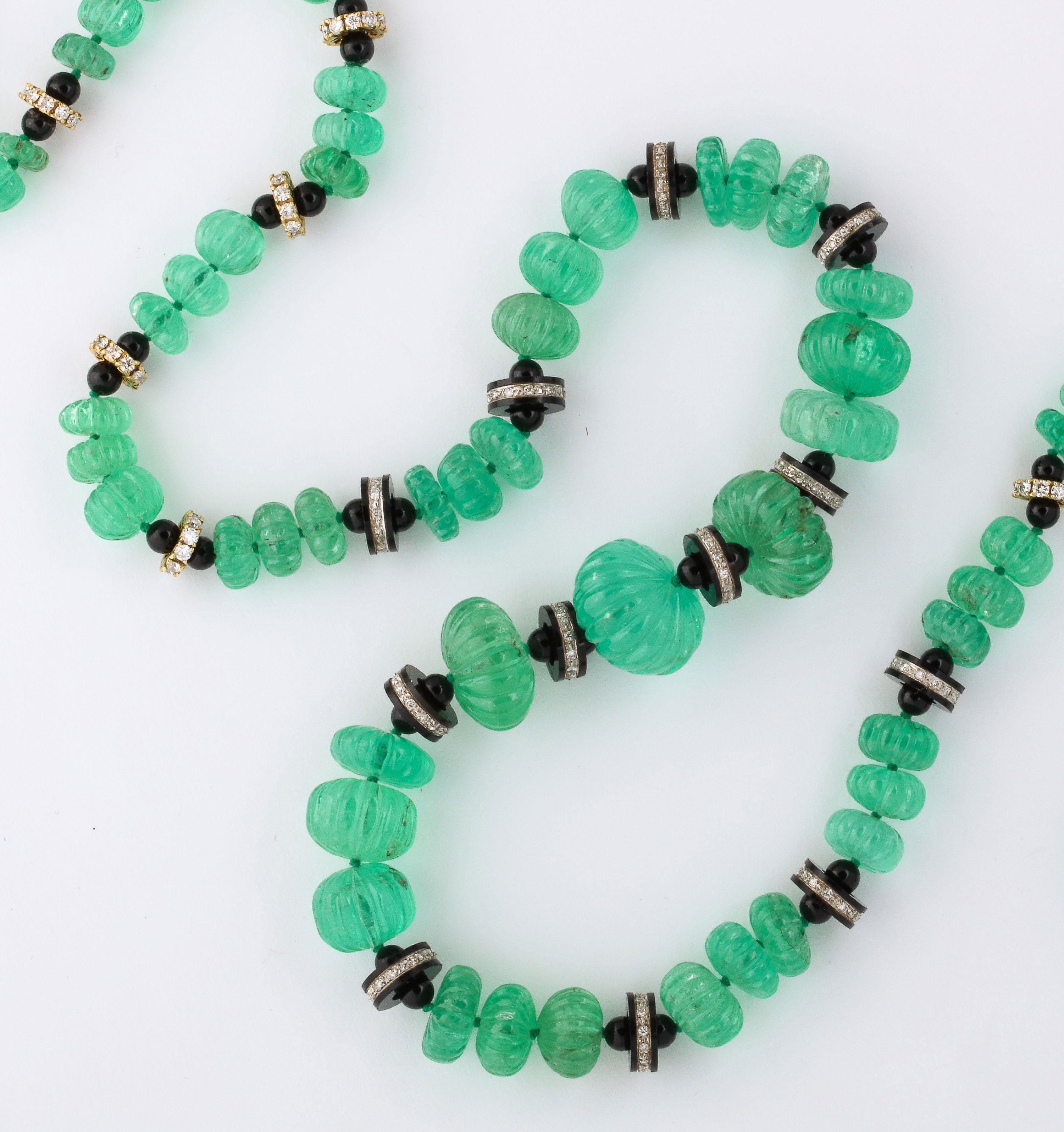 Necklace of Graduated Melon Shaped Emerald Beads with Onyx and Diamond Spacers 1