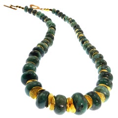  Necklace of Highly Polished Graduated  Green Emerald Rondels with Gold Accents