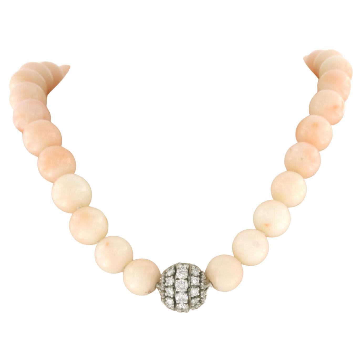 Necklace of pink opal beads with 14k gold lock with diamonds up to 2.10ct