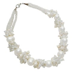 Necklace of Swarovski pearls and freshwater pearls, white coloured