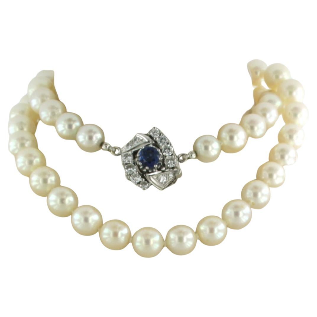 Necklace pearl beads with white gold lock set with sapphire and diamonds 14k For Sale