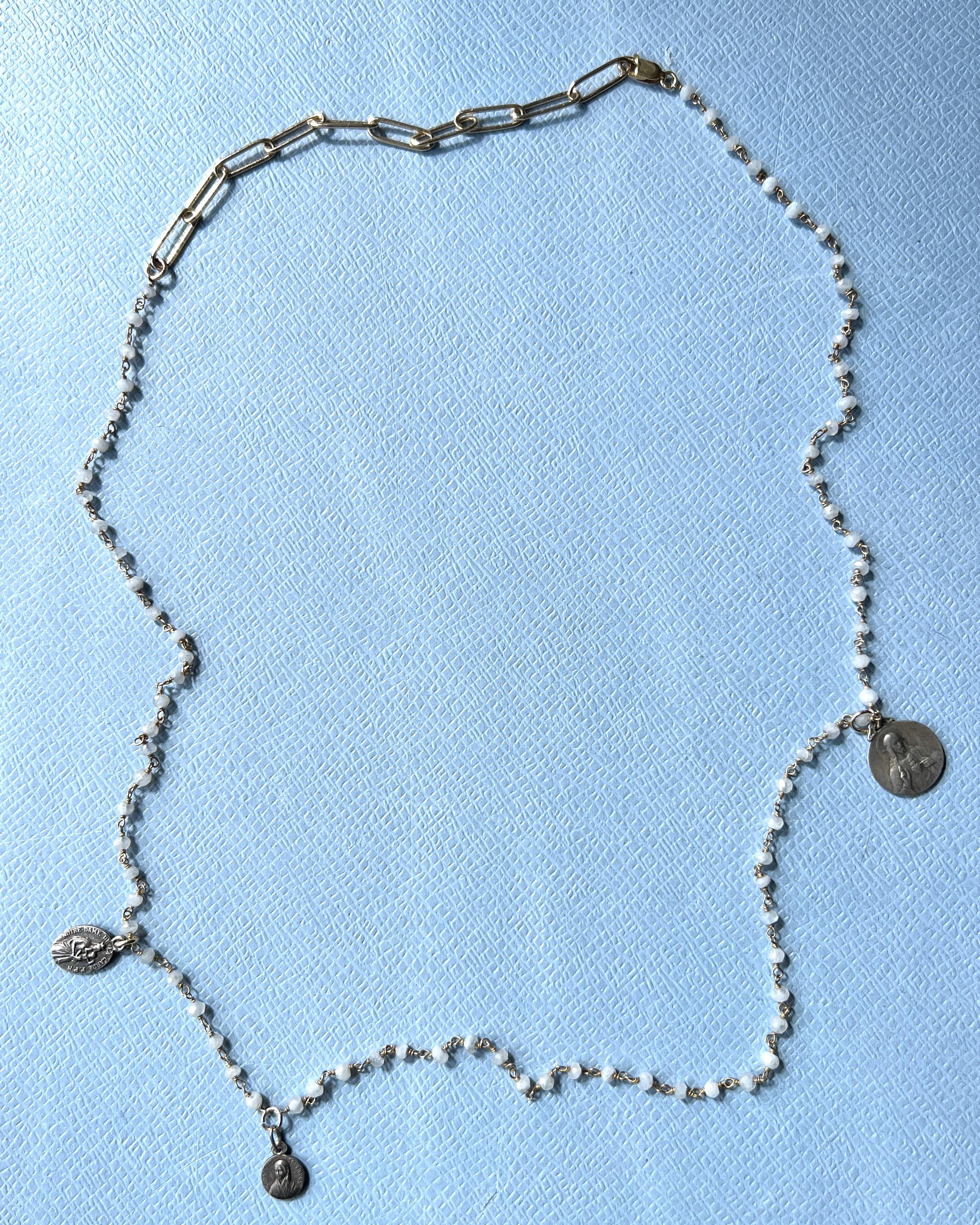 Necklace Rosario French Virgin Mary Medals 

Length: Approximately 24 inches
Adjustable so pls le us know the length you desire. 

This Necklace has white gems and is gold plated and has parts of Silver.

In the broader context of Catholic