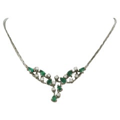 Necklace set with emerald and diamonds 18k white gold
